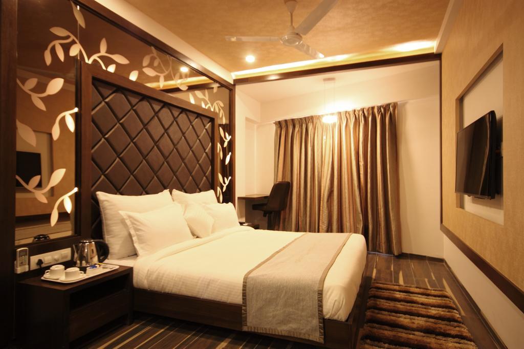Hotel Bait Inn Amhedabad Oda fotoğraf