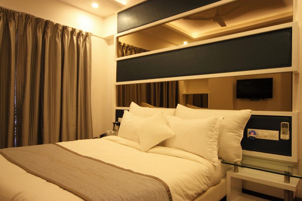 Hotel Bait Inn Amhedabad Oda fotoğraf